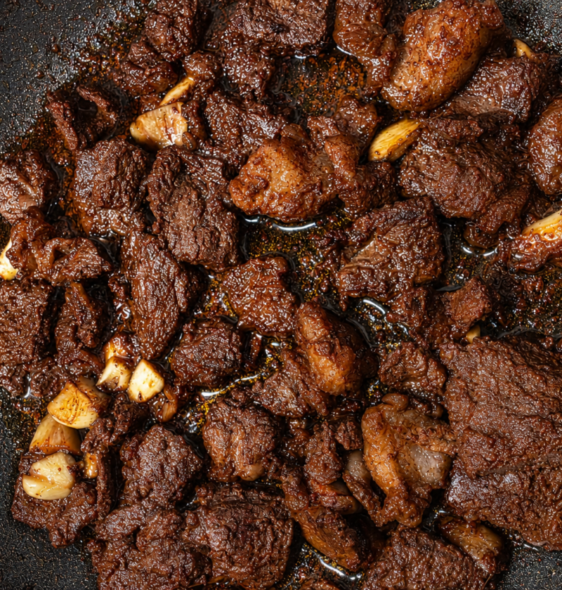 Quick beef tapa with browned sliced beef and garlic, cooked without marinating.